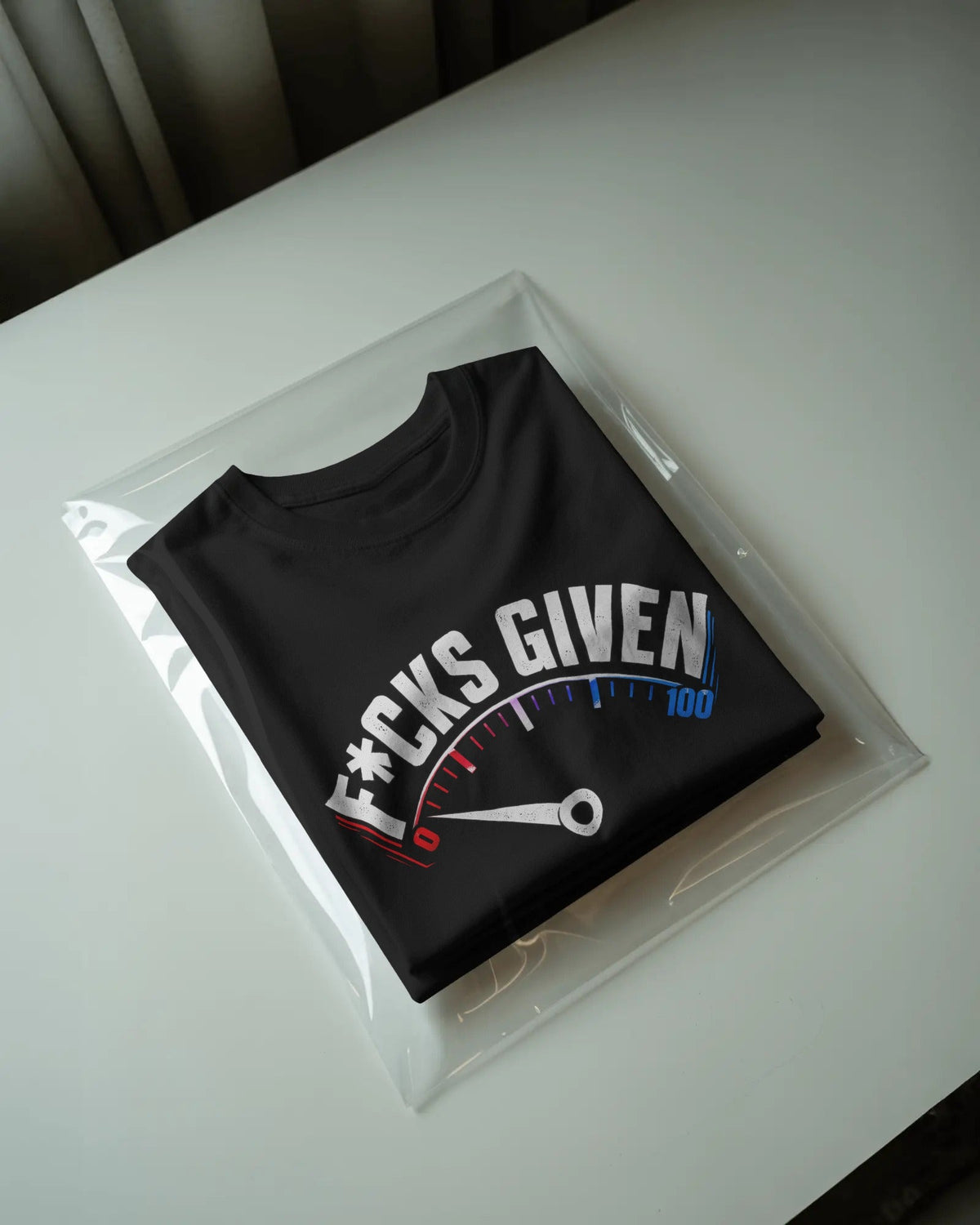 Black 0 FKS GIVEN graphic t-shirt packaged
