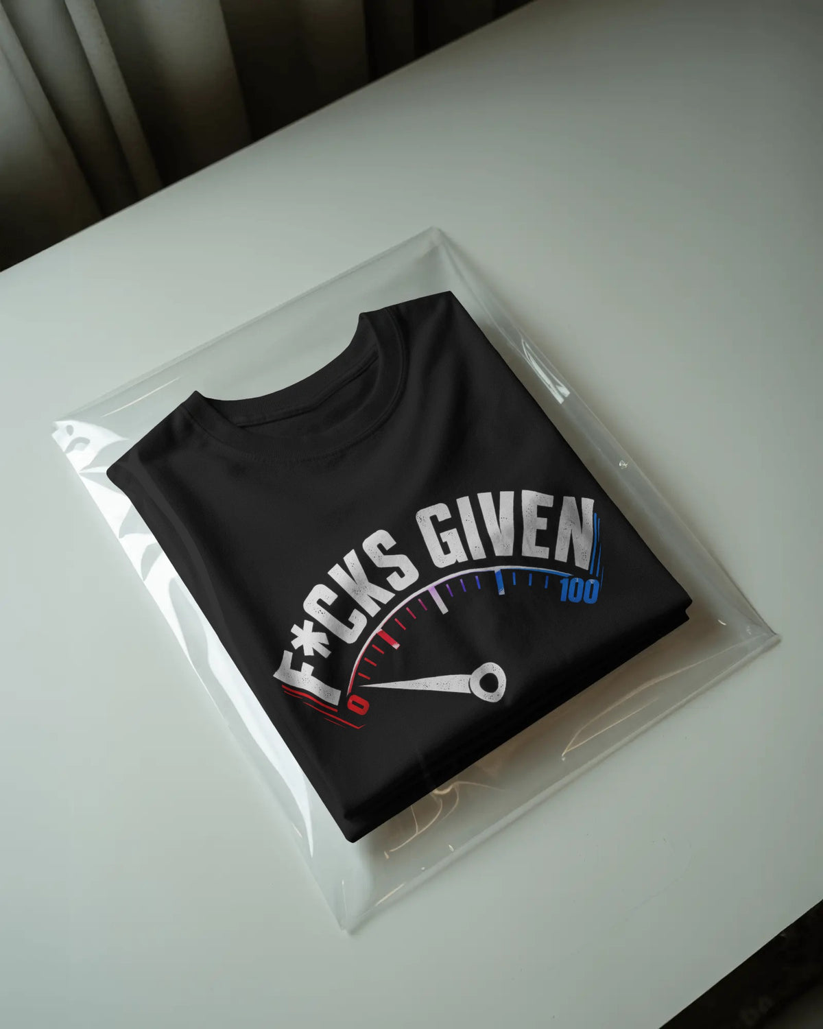Black 0 FKS GIVEN graphic t-shirt packaged