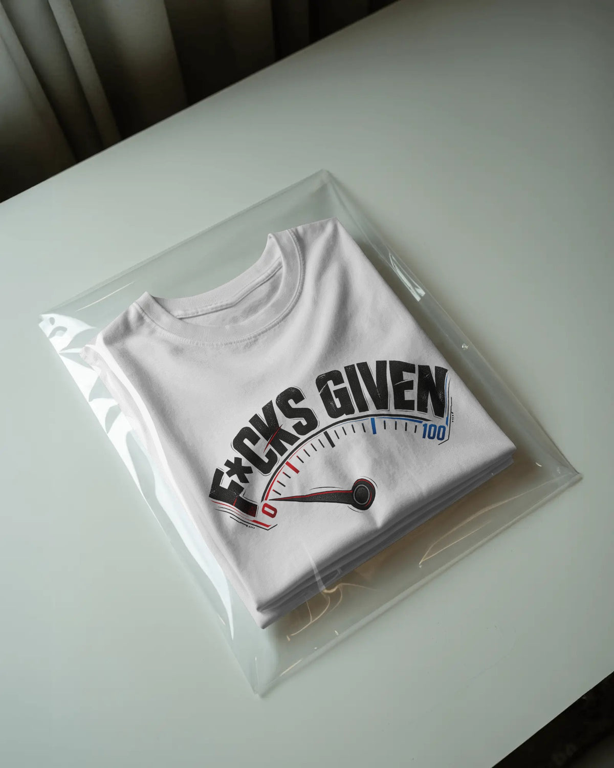White 0 FKS GIVEN graphic t-shirt packaged