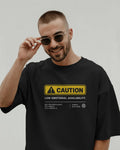 Black Caution graphic t-shirt front model view