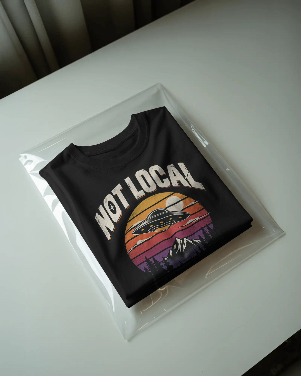 Black Not Local graphic t-shirt packaged