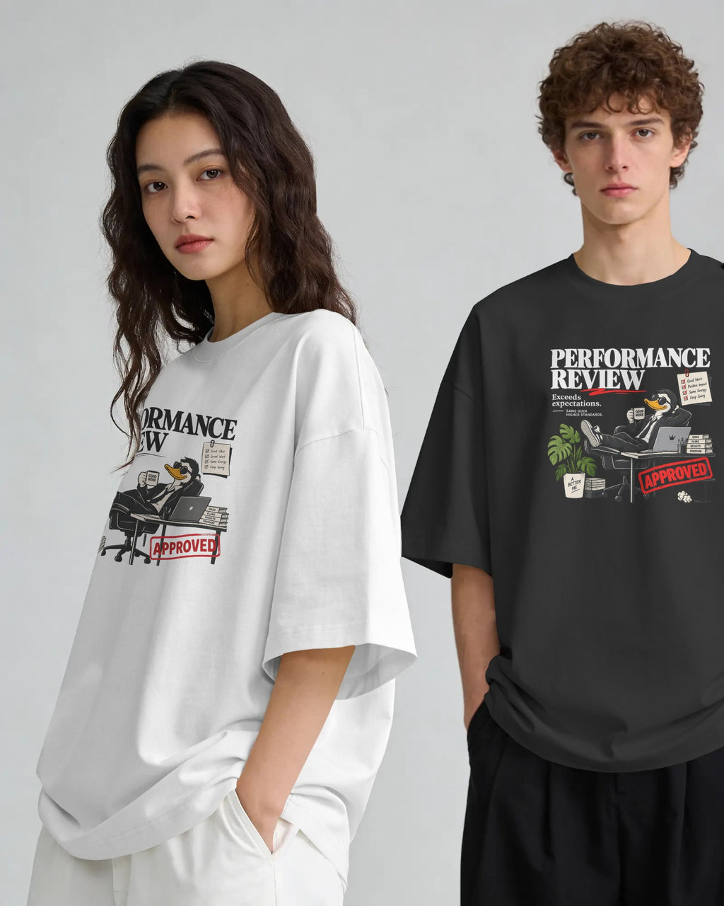 Black and white Performance Review graphic t-shirts on models
