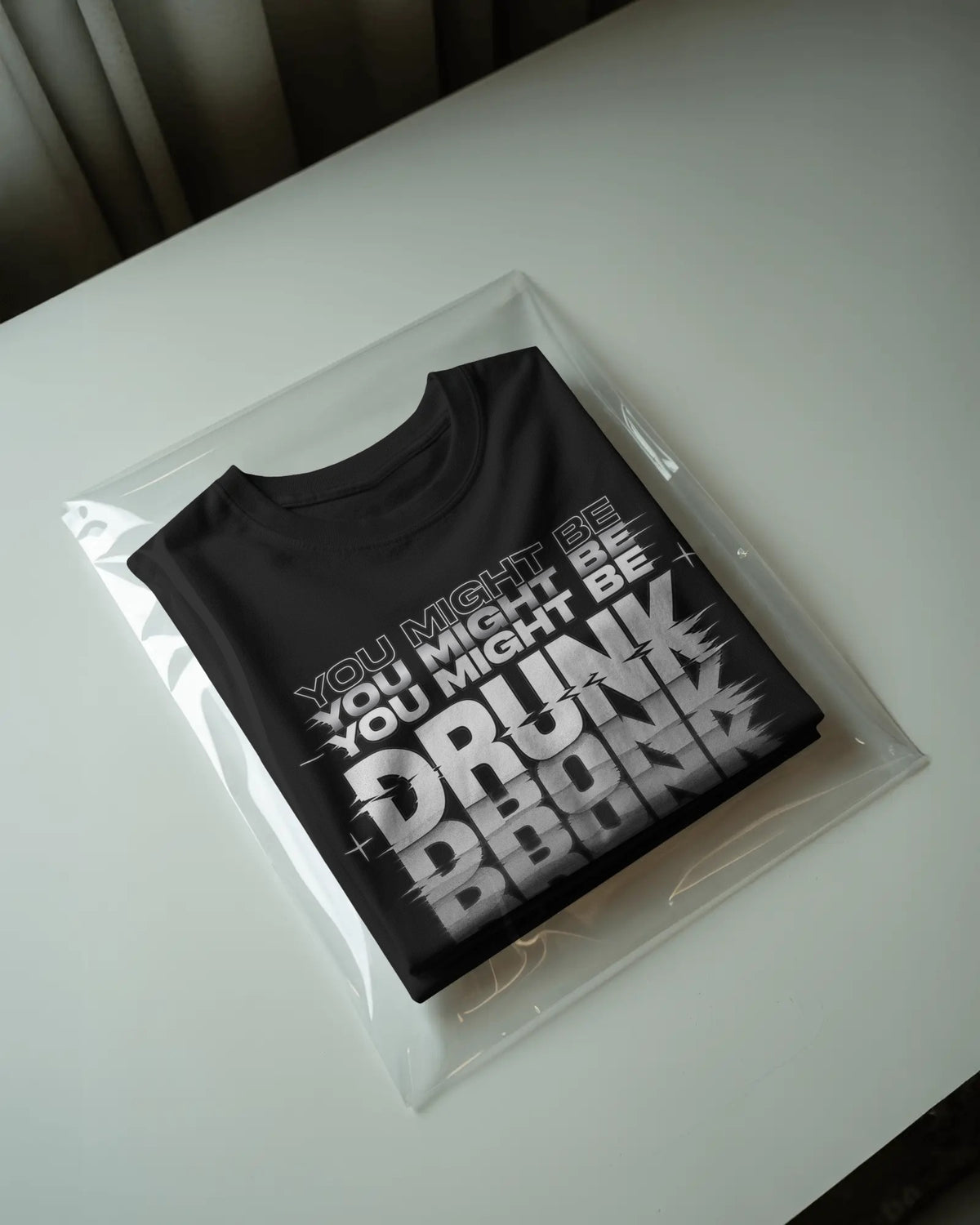 Black U Might B Drunk graphic t-shirt packaged
