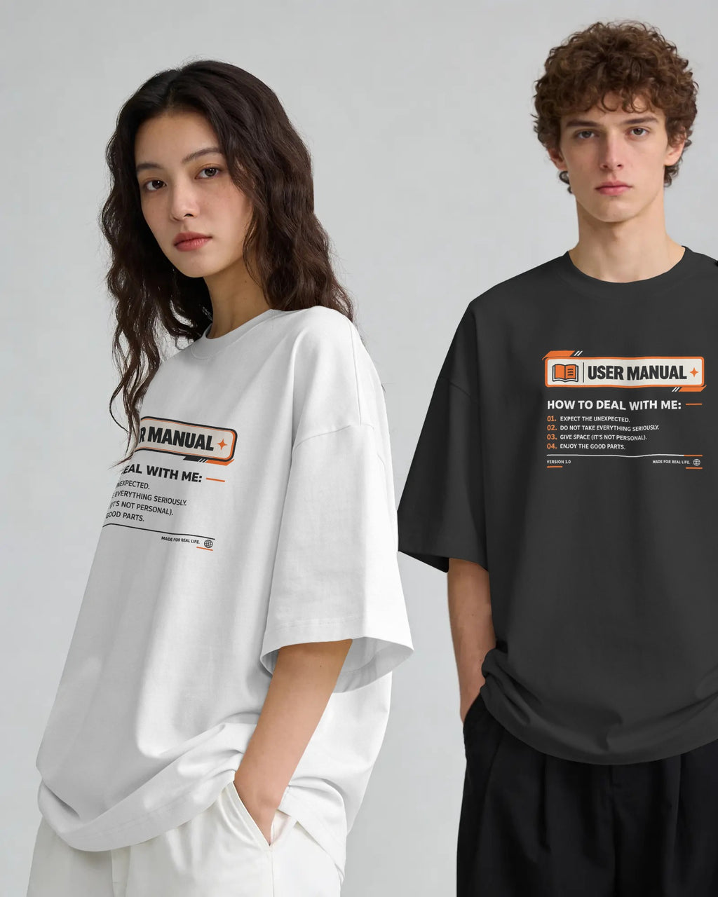 Black and white User Manual graphic t-shirts on models